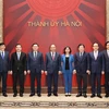 Thủ tướng Nguyễn Xuân Phúc chụp ảnh chung với các lãnh đạo chủ chốt thành phố Hà Nội tham dự buổi làm việc. (Ảnh: Thống Nhất/TTXVN)