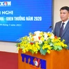 Tổng Giám đốc Thông tấn xã Việt Nam Nguyễn Đức Lợi trình bày báo cáo tổng kết công tác thi đua, khen thưởng của TTXVN năm 2020. (Ảnh: Minh Đức/TTXVN)