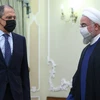 Tổng thống Iran Hassan Rouhani (phải) và Ngoại trưởng Nga Sergei Lavrov. (Nguồn: EPA)