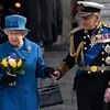 Nữ hoàng Elizabeth II (trái) và Thân vương Philip (phải) tại London , Anh, ngày 13/3/2015. (Ảnh: AFP/TTXVN)