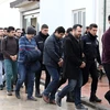 Cảnh sát bắt giữ các nghi can có liên quan tới giáo sỹ Gulen. (Nguồn: dailysabah.com)