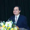 Ông Phùng Xuân Nhạ, Phó Trưởng Ban Tuyên giáo Trung ương phát biểu tại hội nghị. (Ảnh: Phương Hoa/TTXVN)