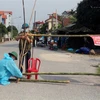 Lực lượng chức năng lập 5 chốt phong tỏa thôn Quan Nhân, xã Nhân Đạo, huyện Lý Nhân, Hà Nam. (Ảnh: Nguyễn Chinh/TTXVN)