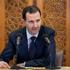Tổng thống Syria Bashar al-Assad phát biểu trong một cuộc họp tại Damascus. (Ảnh: AFP/TTXVN)