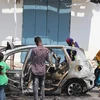Hiện trường một vụ đánh bom xe ở Mogadishu, Somalia. (Ảnh: AFP/TTXVN)
