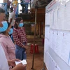 Người dân tại xã Bù Gia Mập, Bình Phước đi bầu cử. (Ảnh: K GỬIH/TTXVN)