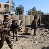 Hiện trường một vụ tấn công tại Afghanistan. (Ảnh: AFP/TTXVN)