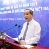 Ông Lê Khánh Hải, Ủy viên Trung ương Đảng, Bộ trưởng, Chủ nhiệm Văn phòng Chủ tịch nước, công bố Quyết định về đặc xá năm 2021 của Chủ tịch nước. (Ảnh: Phạm Kiên/TTXVN)