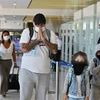 Du khách quốc tế tới sân bay quốc tế Phuket, Thái Lan. (Ảnh: AFP/TTXVN)