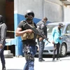 Lực lượng an ninh canh gác bên ngoài dinh thự của cố Tổng thống Jovenel Moise. (Nguồn: AFP)