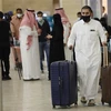 Hành khách tại sân bay quốc tế King Khaled ở Riyadh, Saudi Arabia. (Ảnh: AFP/TTXVN)