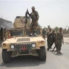 Lực lượng an ninh Afghanistan tham gia chiến dịch truy quét Taliban tại tỉnh Laghman. (Ảnh: THX/TTXVN)
