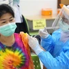 Tiêm vaccine Sinovac phòng COVID-19 cho người dân tại Pattani, Thái Lan. (Ảnh: AFP/TTXVN)