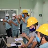 Cán bộ, kỹ sư Công ty CP Thủy điện Đa Nhim-Hàm Thuận-Đa Mi chứng kiến thời khắc tổ máy H5 thủy điện Đa Nhim hòa lưới thành công. (Nguồn: evn.com.vn)