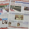 Các báo Lào đưa tin, bài đậm nét về hoạt động trong chuyến thăm của Chủ tịch nước Nguyễn Xuân Phúc cùng đoàn. (Ảnh: Phạm Kiên/TTXVN)