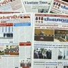 Các báo lớn của Lào đăng tin, bài dày đặc về chuyến thăm hữu nghị chính thức nước Lào của Chủ tịch nước Nguyễn Xuân Phúc và Đoàn đại biểu cấp cao Việt Nam. (Ảnh: Phạm Kiên/TTXVN)