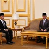 Thủ tướng Malaysia Muhyiddin Yassin (trái) hội kiến Quốc vương Sultan Abdullah Sultan Ahmad Shah, tại Kuala Lumpur ngày 28/10/2020. (Ảnh: THX/TTXVN)
