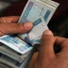 Đồng afghani giảm xuống mức thấp kỷ lục. (Nguồn: thefrontierpost.com)
