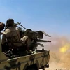 Binh sỹ quân đội chính phủ Yemen giao tranh với phiến quân Houthi tại Marib, Yemen. (Ảnh: AFP/TTXVN)