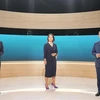(Từ trái sang) Các ứng cử viên Thủ tướng Đức: ông Olaf Scholz, bà Annalena Baerbock và ông Armin Laschet trong cuộc tranh luận trực tiếp lần thứ 2 trên truyền hình ở thủ đô Berlin, tối 12/9. (Ảnh: AFP/TTXVN)