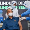 Một điểm tiêm vaccine ngừa COVID-19 tại Putrajaya, Malaysia. (Ảnh: AFP/TTXVN)