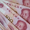 Đồng tiền giấy mệnh giá 100 nhân dân tệ của Trung Quốc. (Ảnh: AFP/TTXVN)