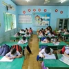 Giáo viên ở nhiều trường tại thành phố Gia Nghĩa rất vất vả vì nhiều học sinh là người dân tộc thiểu số, không biết tiếng Kinh. (Ảnh: Hưng Thịnh/TTXVN)