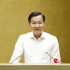 Phó Thủ tướng Lê Minh Khái báo cáo chuyên đề "Về tiếp tục đổi mới, phát triển và nâng cao hiệu quả kinh tế tập thể trong giai đoạn mới" tại hội nghị. (Ảnh: Phương Hoa/TTXVN)