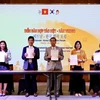 Lễ ký kết hợp tác giữa các Hiệp hội, Hội doanh nhân, doanh nghiệp Việt-Hàn với tỉnh Đồng Nai. (Ảnh: Hồng Giang/TTXVN)