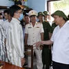 Chủ tịch nước Nguyễn Xuân Phúc thăm và kiểm tra công tác đặc xá tại phân trại số 1. (Ảnh: Thống Nhất/TTXVN)