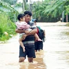 Nước lũ từ đầu nguồn Sông Buông chảy qua địa bàn phường Phước Tân ở mức cao khiến nhiều tuyến đường của phường bị ngập sâu. (Nguồn: baodongnai.com.vn)