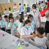 Tiêm vaccine phòng COVID-19 cho trẻ em tại trường Tiểu học Ngô Sỹ Liên, thành phố Bắc Giang (Bắc Giang). (Ảnh: Danh Lam/TTXVN)