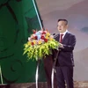 Tổng Biên tập Báo Nhân dân, Chủ tịch Hội Nhà báo Việt Nam Lê Quốc Minh phát biểu khai mạc chương trình. (Ảnh: Tá Chuyên/TTXVN)
