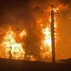 Ngọn lửa đã bùng phát tại kho chứa nước hoa trong khu công nghiệp al-Waziriyah. (Nguồn: shafaq.com)