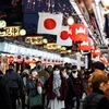 Một phố mua sắm tại Tokyo, Nhật Bản. (Ảnh: AFP/TTXVN)