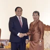 Thủ tướng Phạm Minh Chính tiếp Phó Thủ tướng, Chủ tịch Hội Hữu nghị Việt Nam-Campuchia Men Sam An. (Ảnh: Dương Giang/TTXVN)
