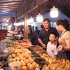 Nhiều món ăn đường phố đặc sắc được giới thiệu tại Lễ hội Ẩm thực Thắm tình hữu nghị khối ASEAN 2022 . (Ảnh: Xuân Khu/TTXVN)