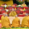 Nghi thức suy tôn Đức Trưởng lão Hòa thượng Thích Trí Quảng lên ngôi vị Pháp chủ Hội đồng Chứng minh Giáo hội Phật giáo Việt Nam. (Ảnh: Minh Đức/TTXVN)