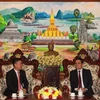 Đoàn Tổng lãnh sự quán Việt Nam tại Pakse chúc mừng Quốc khánh Lào tại tỉnh Champasak. (Ảnh Đỗ Bá Thành/TTXVN)