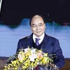 Chủ tịch nước Nguyễn Xuân Phúc phát biểu tại buổi lễ. (Ảnh: Thống Nhất/TTXVN)