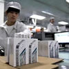 Dây chuyền sản xuất điện thoại iPhone tại nhà máy của Foxconn. (Nguồn: macrumors.com)