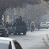 Lực lượng an ninh Taliban được triển khai tại hiện trường vụ tấn công ở Kabul, Afghanistan ngày 12/12. (Ảnh: AFP/TTXVN)