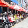 Cửa hàng bán xe trên đường Nguyễn Huệ, thành phố Cao Lãnh. (Ảnh: Nguyễn Văn Trí/TTXVN)
