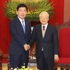 Tổng Bí thư Nguyễn Phú Trọng và Chủ tịch Quốc hội Hàn Quốc Kim Jin-pyo chụp ảnh chung. (Ảnh : Trí Dũng/TTXVN)