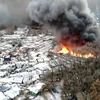 60 ngôi nhà được cho là đã bị thiêu trụi trong đám cháy ở làng Guryong. (Nguồn: Yonhap)