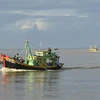 Tàu đánh bắt hải sản về Cảng cá Phan Thiết. (Ảnh: Nguyễn Thanh/TTXVN)