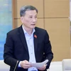 Chủ nhiệm Ủy ban Khoa học, Công nghệ và Môi trường Lê Quang Huy trình bày báo cáo. (Ảnh: Doãn Tấn/TTXVN)