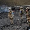 Binh sỹ Ukraine tại khu vực giao tranh với lực lượng Nga ở thủ đô Kiev. (Ảnh: AFP/TTXVN)