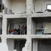 Tòa nhà tại Aleppo, Syria bị phá hủy sau trận động đất kinh hoàng. (Ảnh: AFP/TTXVN)