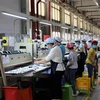 Hoạt động sản xuất tại Công ty TNHH PouYuen Việt Nam. (Ảnh: TTXVN phát)